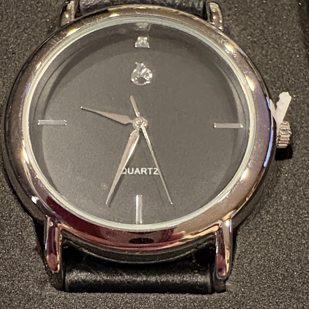 Black And Silver Quartz Watch With Diamond
